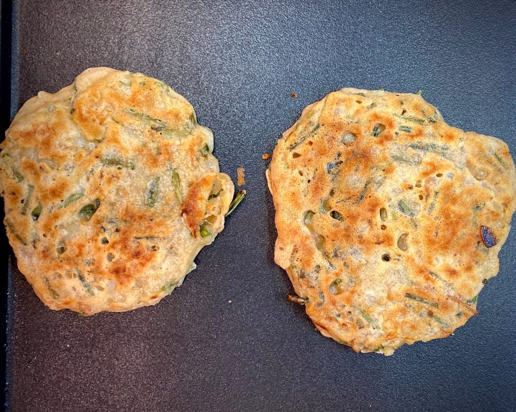 2 pancakes cooking