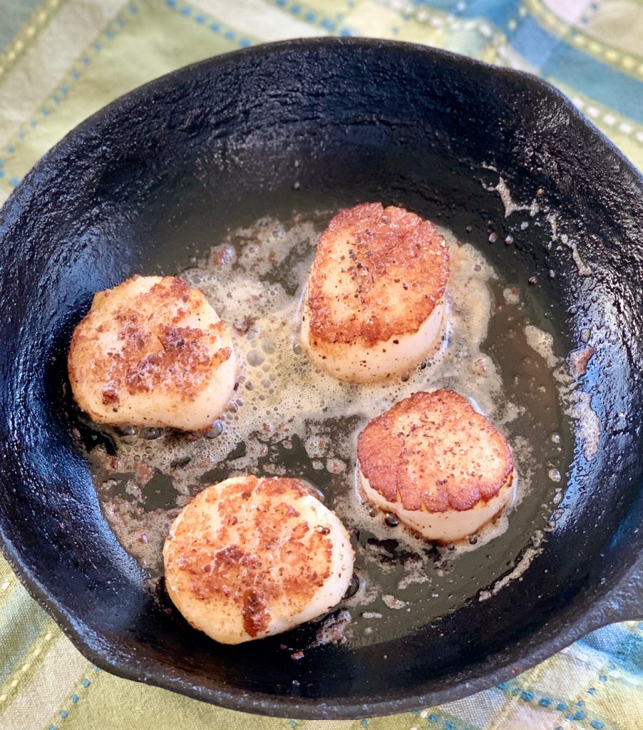 4 seared scallops in cast iron
