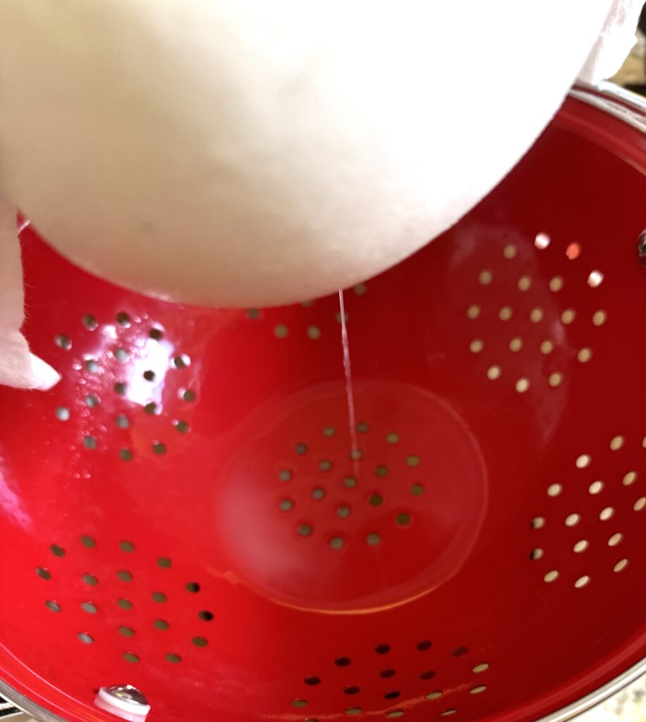 Drain whey from cheese