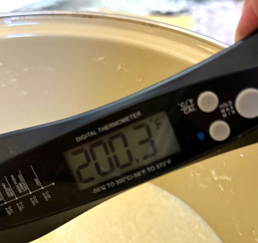 Heat ricotta cheese to 200 F