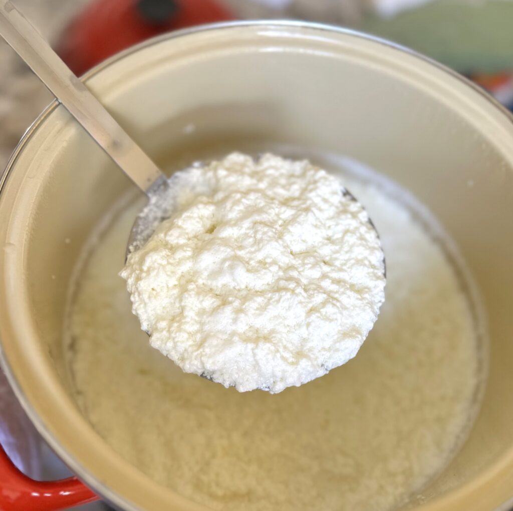 Spooning ricotta cheese