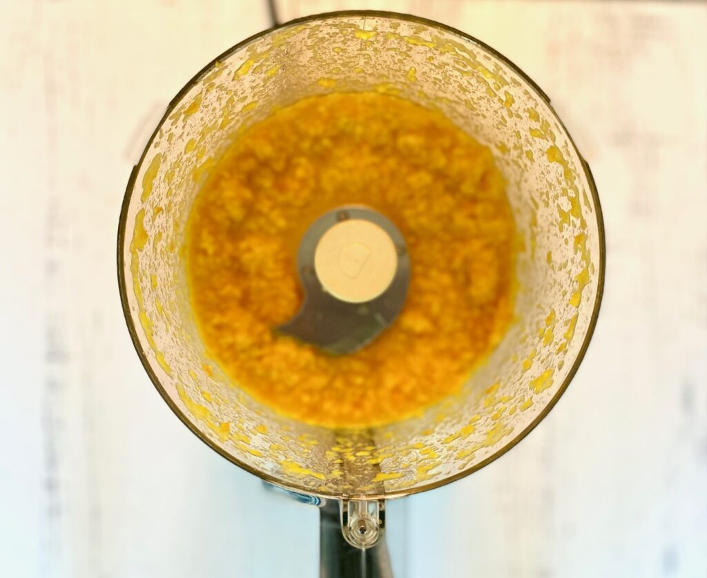 pulverized oranges in food processor