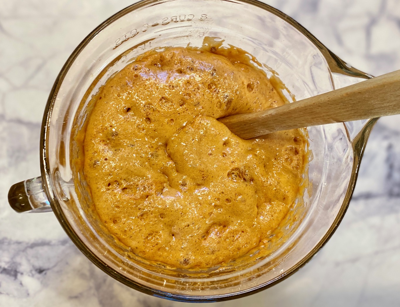 peanut brittle cooking in glass bowl
