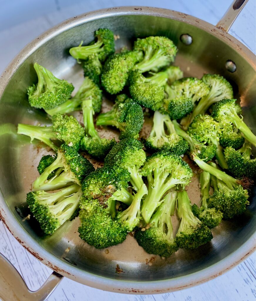 Broccoli and garlic in saute pan