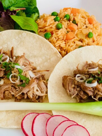 Carnitas tacos and rice