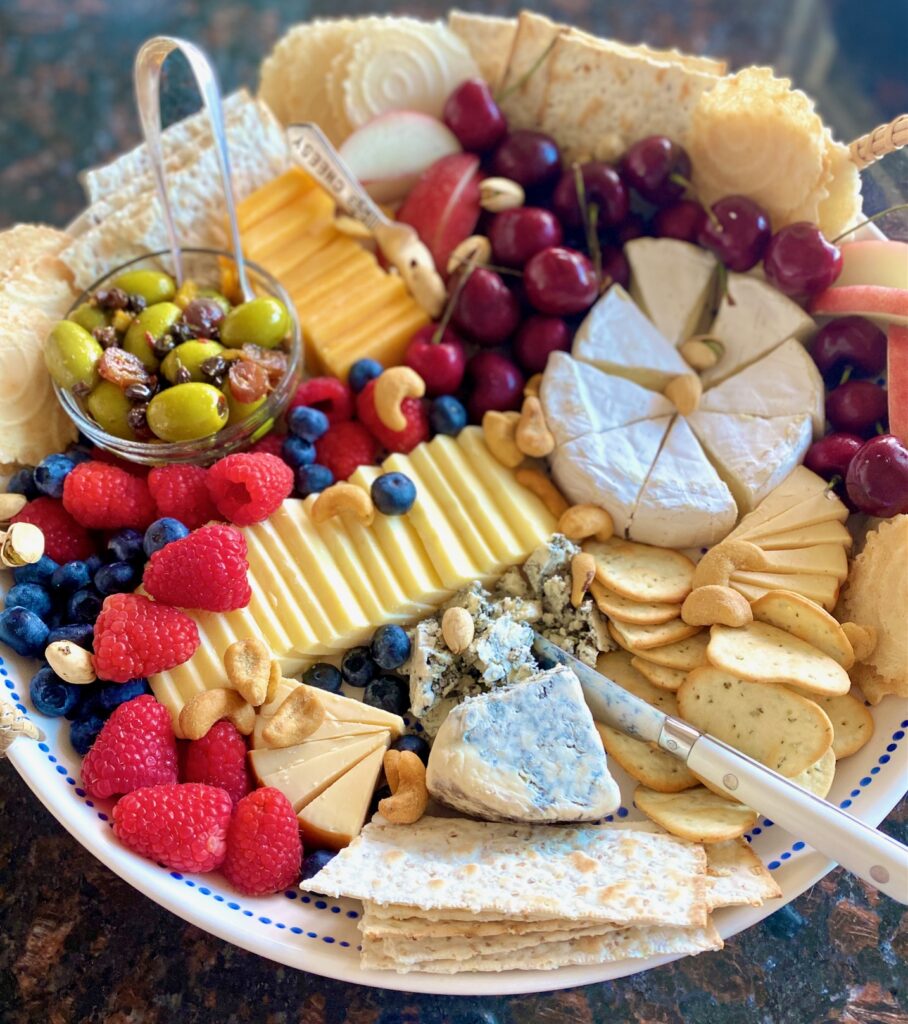 variety of cheeses, crackers and nuts