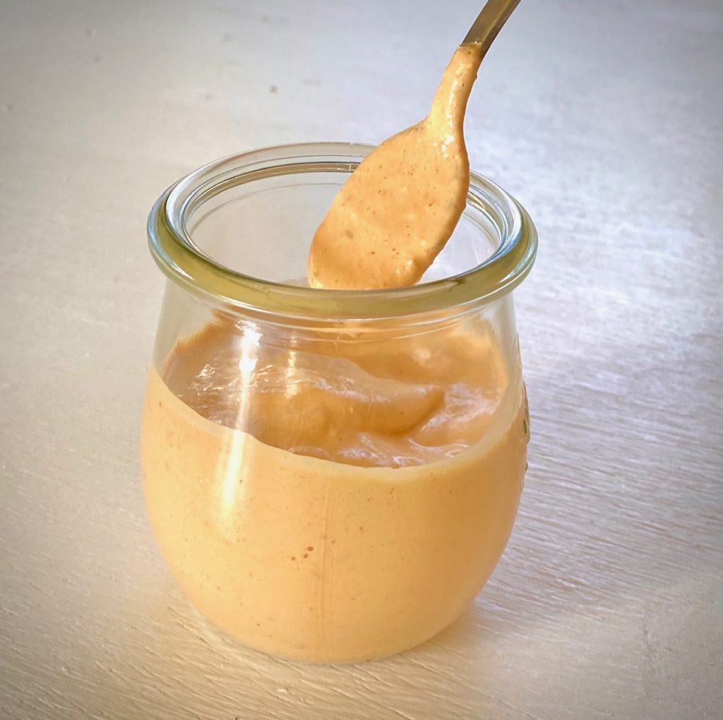 Chipotle dressing with spoon