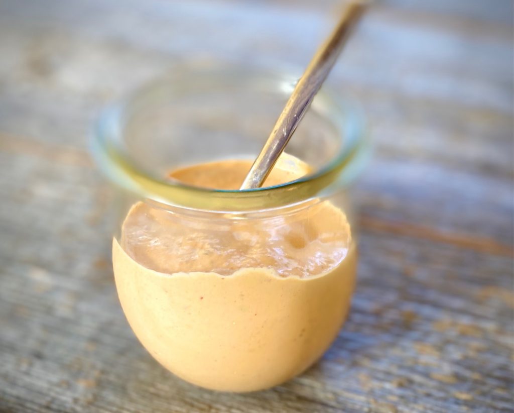 Southwest Ranch Dressing in a jar with spoon