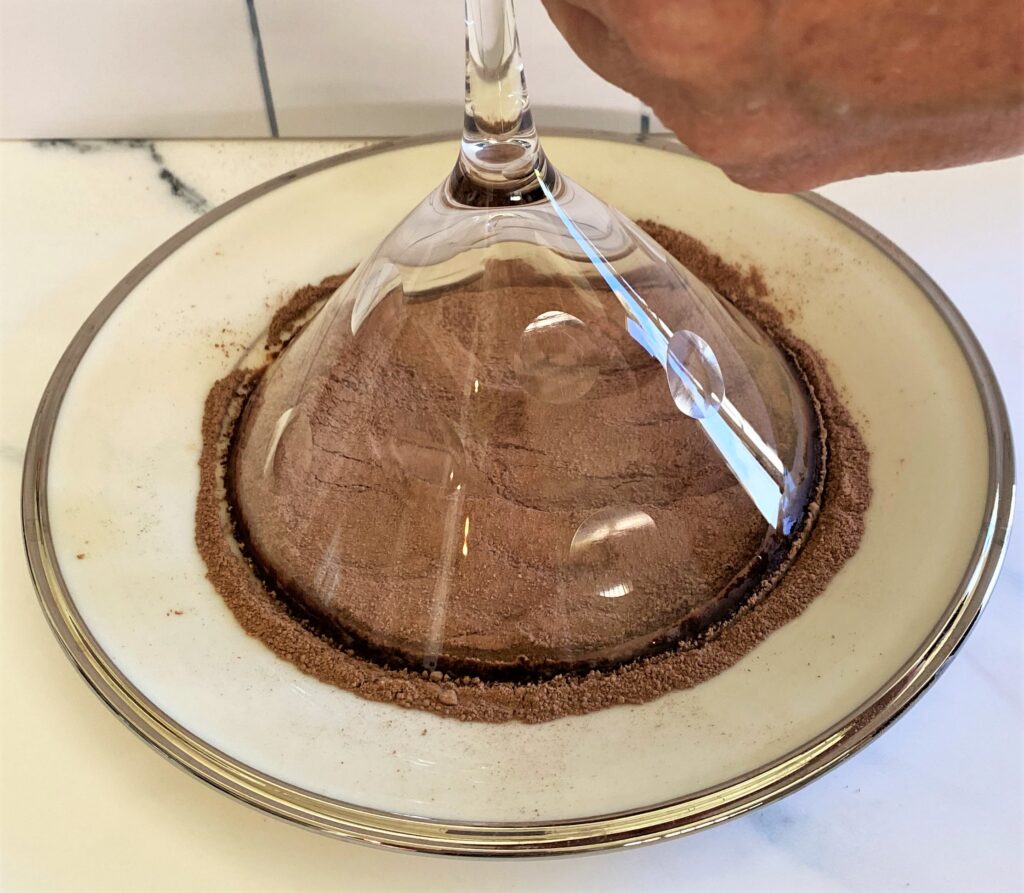 Dip glass in chocolate cocoa