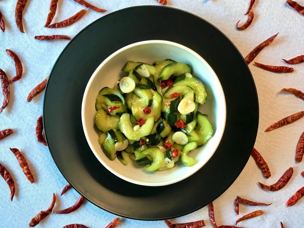 Asian Cucumber Salad in black bowl