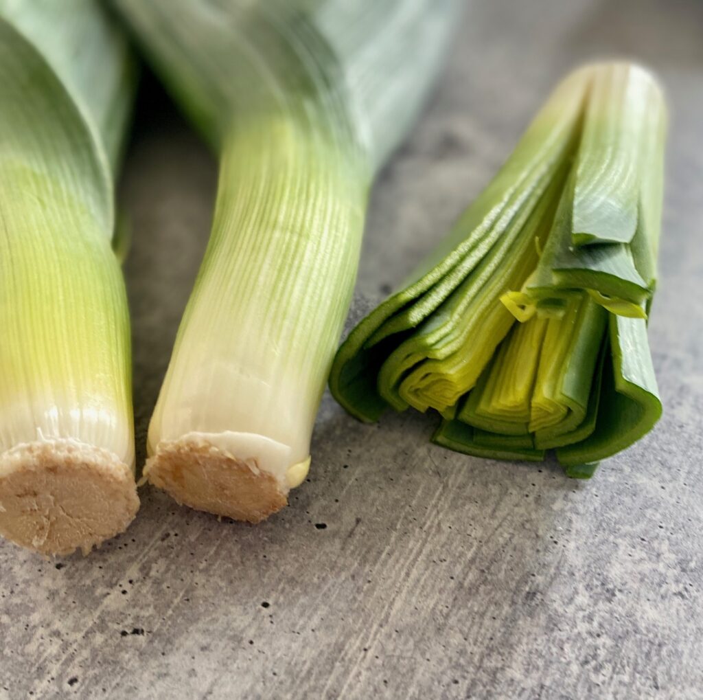 cut leek close up with 2 whole