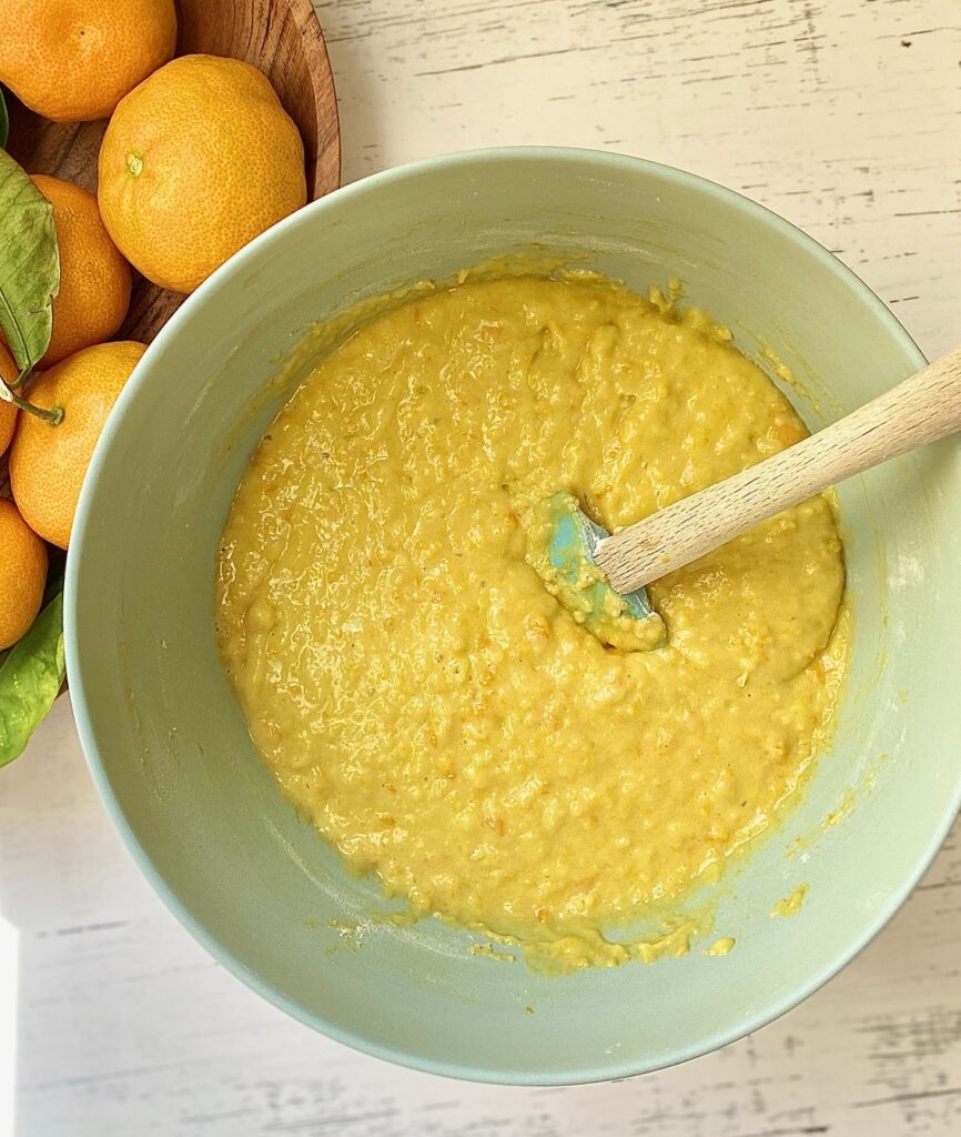 fully mixed orange olive oil cake in bowl