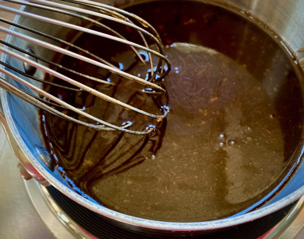 whisk and glaze in a pan