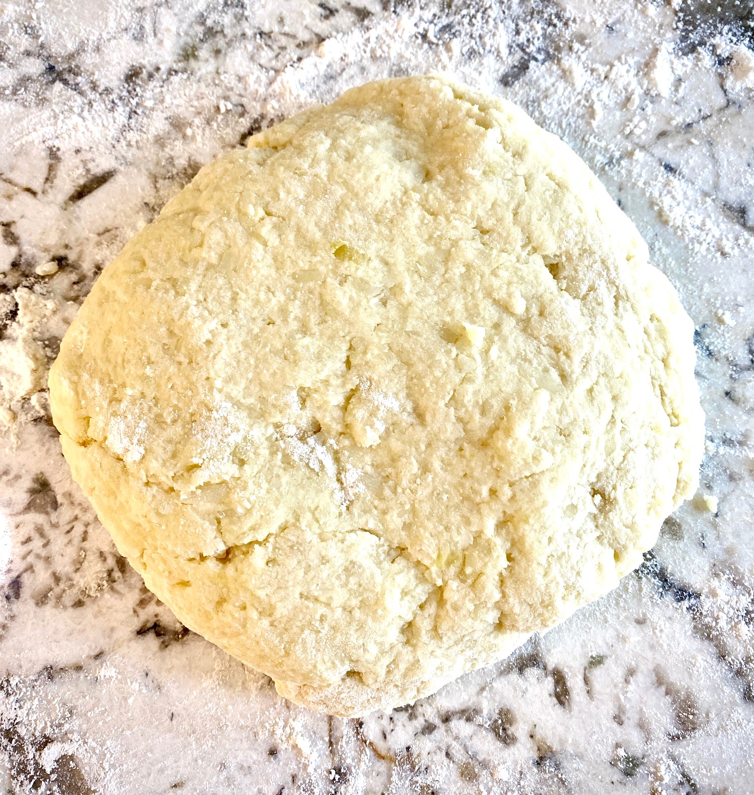 Set gnocchi ball aside and cover