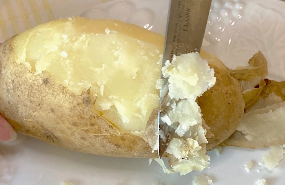 Peel skin off potatoes