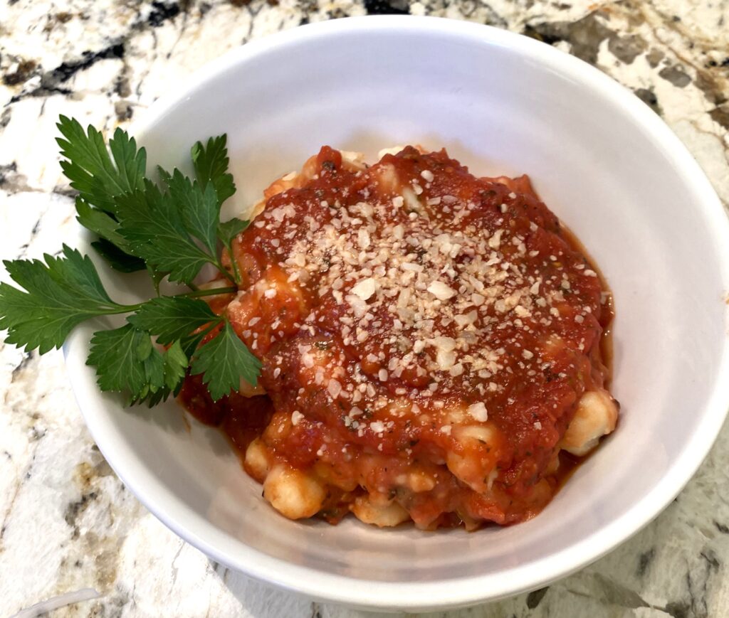 gnocchi with red sauce in a bowl