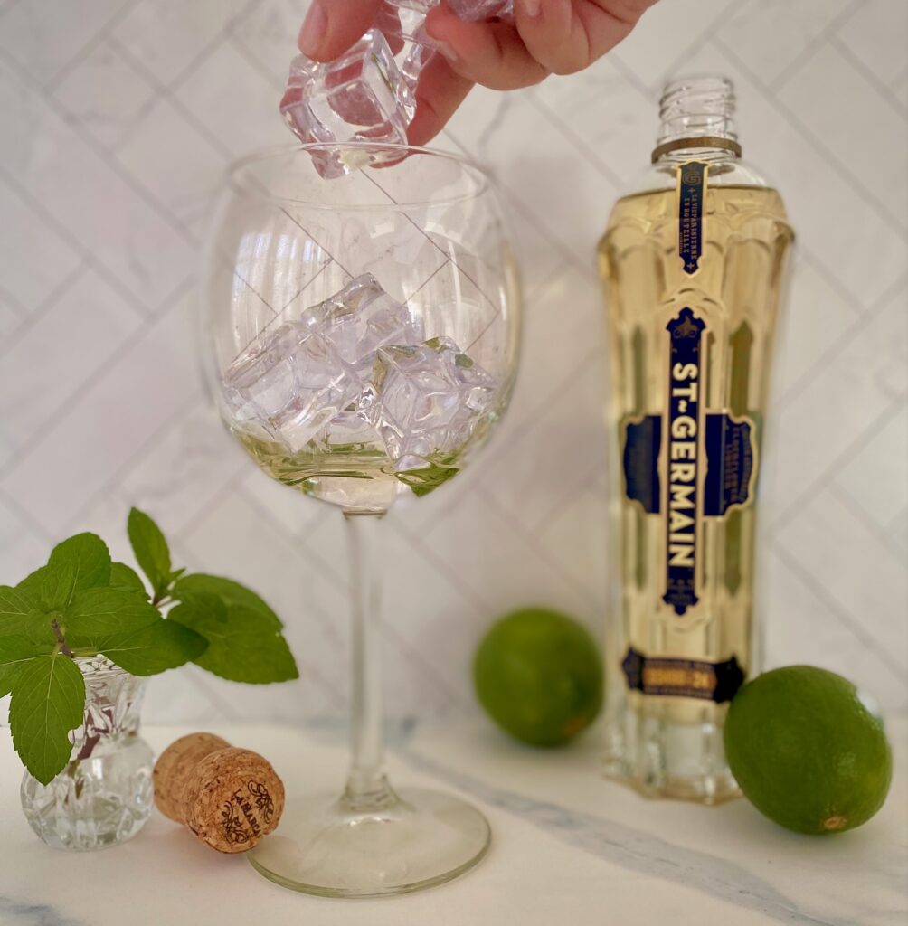 adding ice to a drink