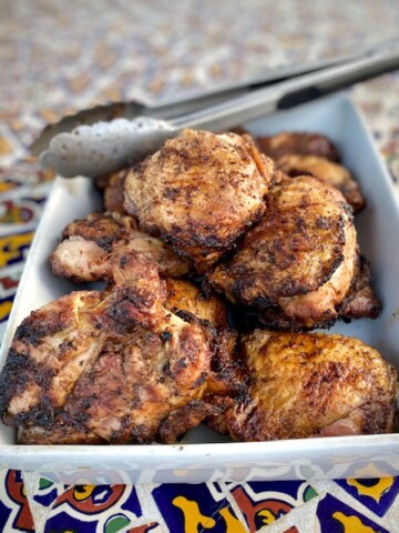 Jerk Chicken in a white baking dish