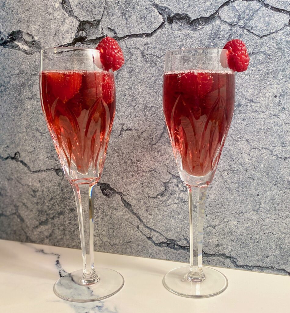 two kir royale cocktails with garnish