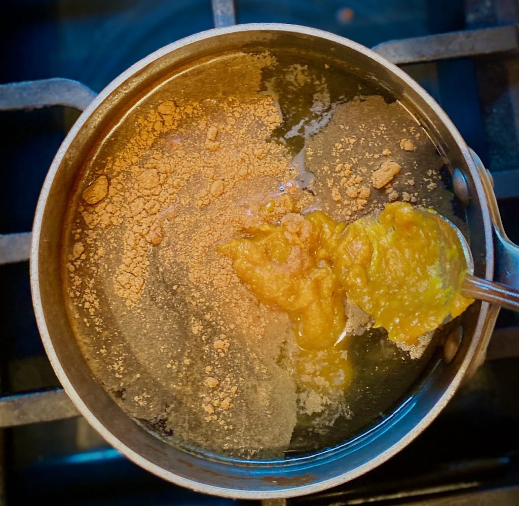 Pumpkin syrup ingredients in a pan