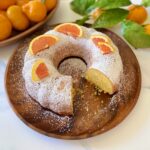 orange cake with powdered sugar