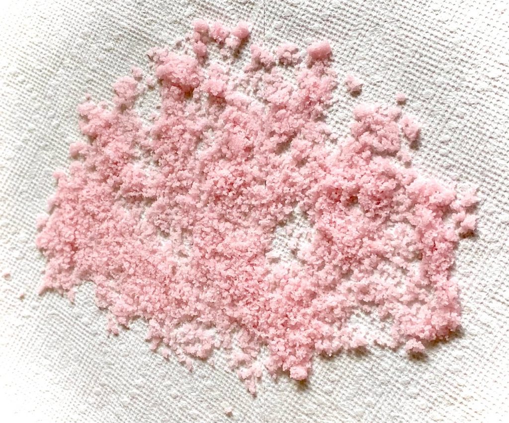 Pink sugar on a paper towel