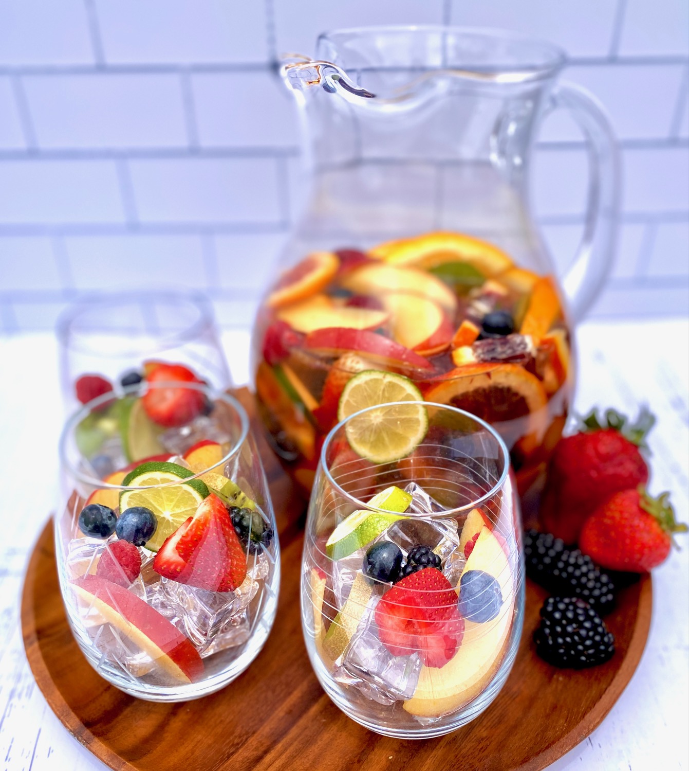 pitcher and glasses of fruit