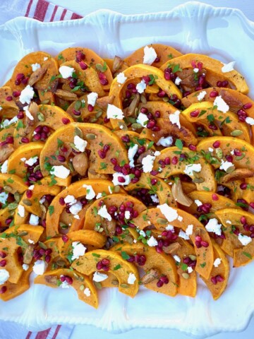 Platter of Roasted Butternut Squash with Pomegranate, Goat Cheese and Parsley