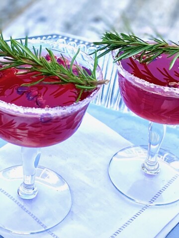 2 garnished pom drinks