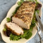 roast pork loin on a cream platter