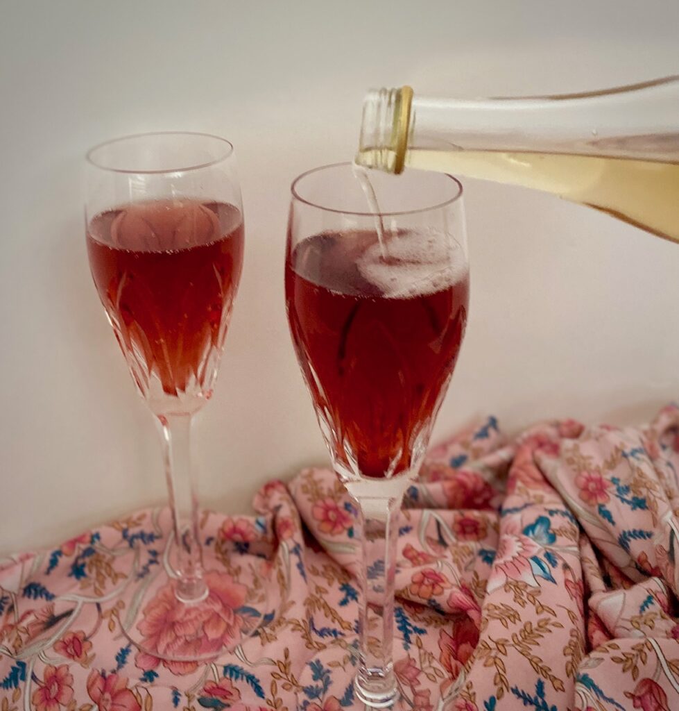 pouring champagne in glasses