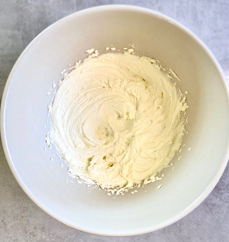 butter and sugar beaten together in a bowl