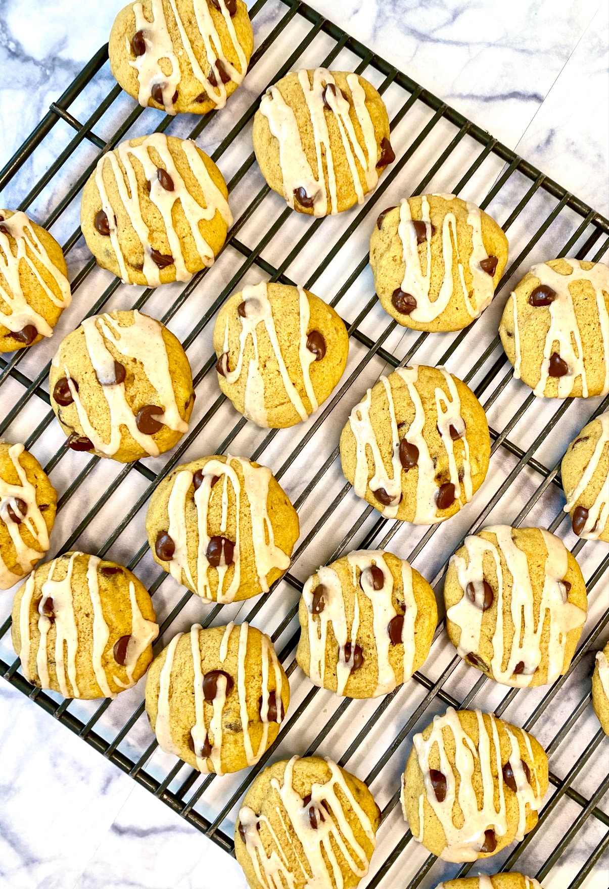 Pumpkin Spice Cookies with Chocolate Chips on a cooling rack