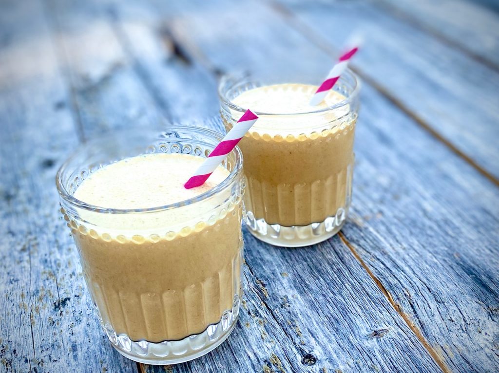 2 shakes with pink and white straws