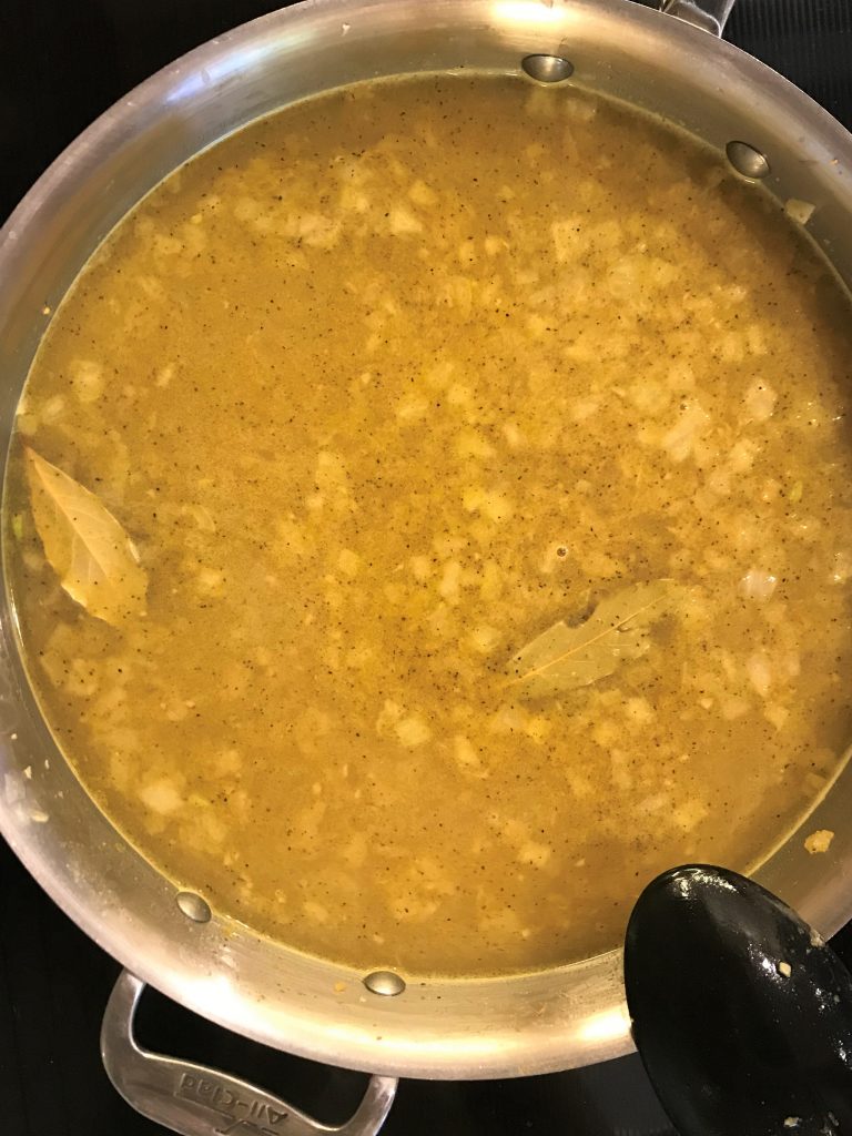 Add in stock and remaining spices to soup
