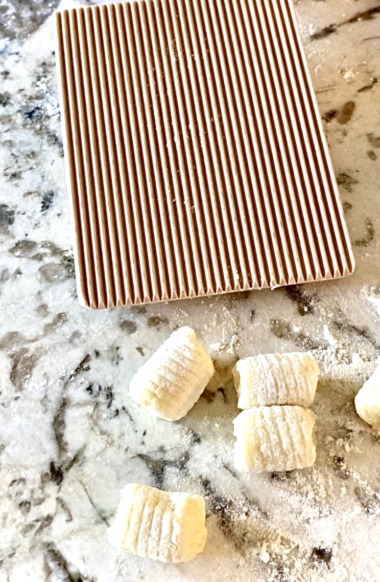gnocchi board with uncooked pieces
