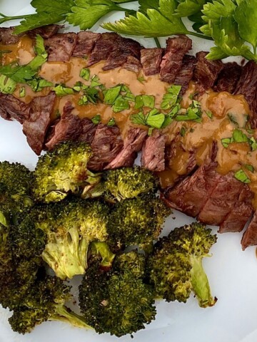 Seared Skirt steak with mustard and a side of broccoli