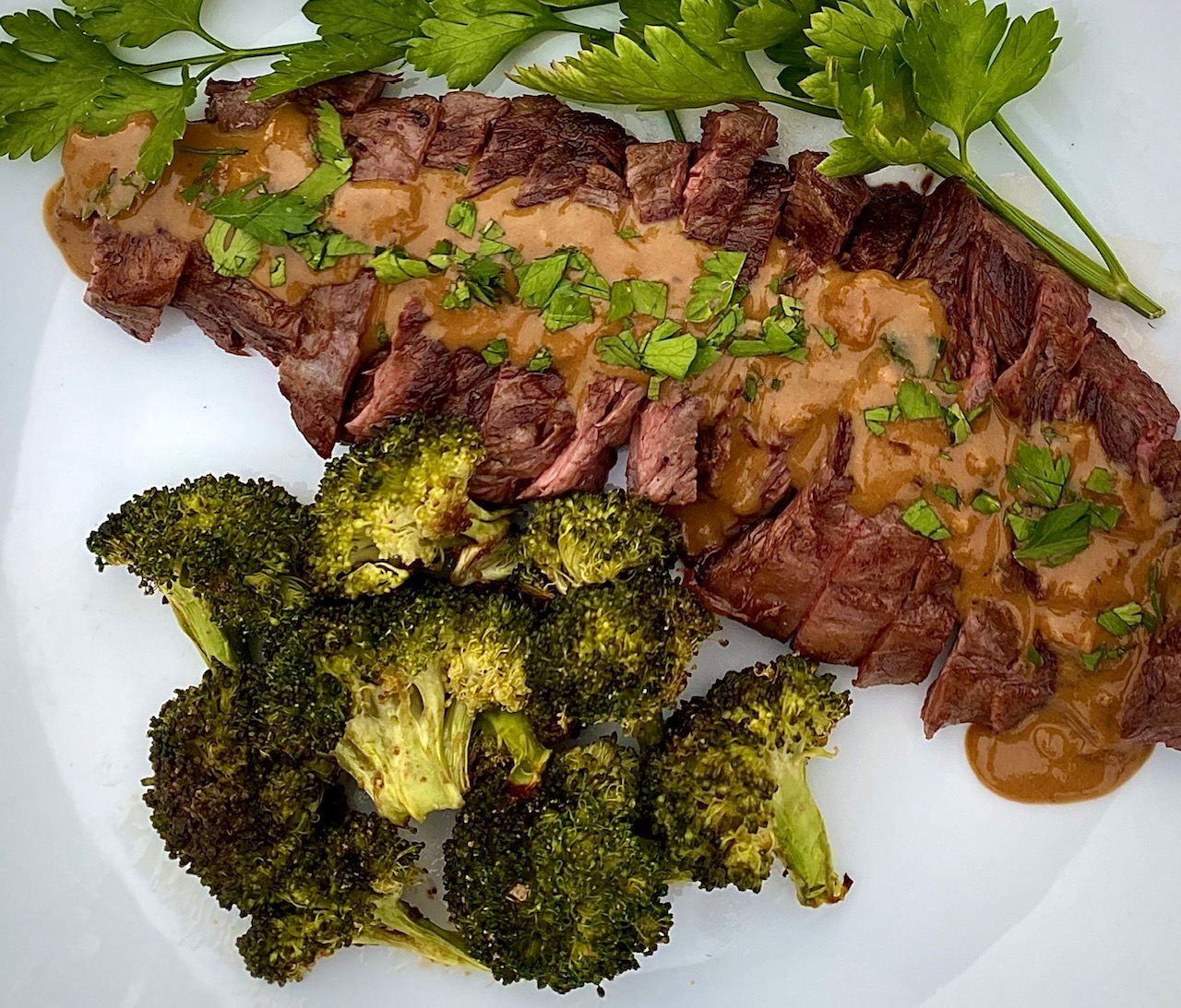 Seared Skirt steak with mustard and a side of broccoli