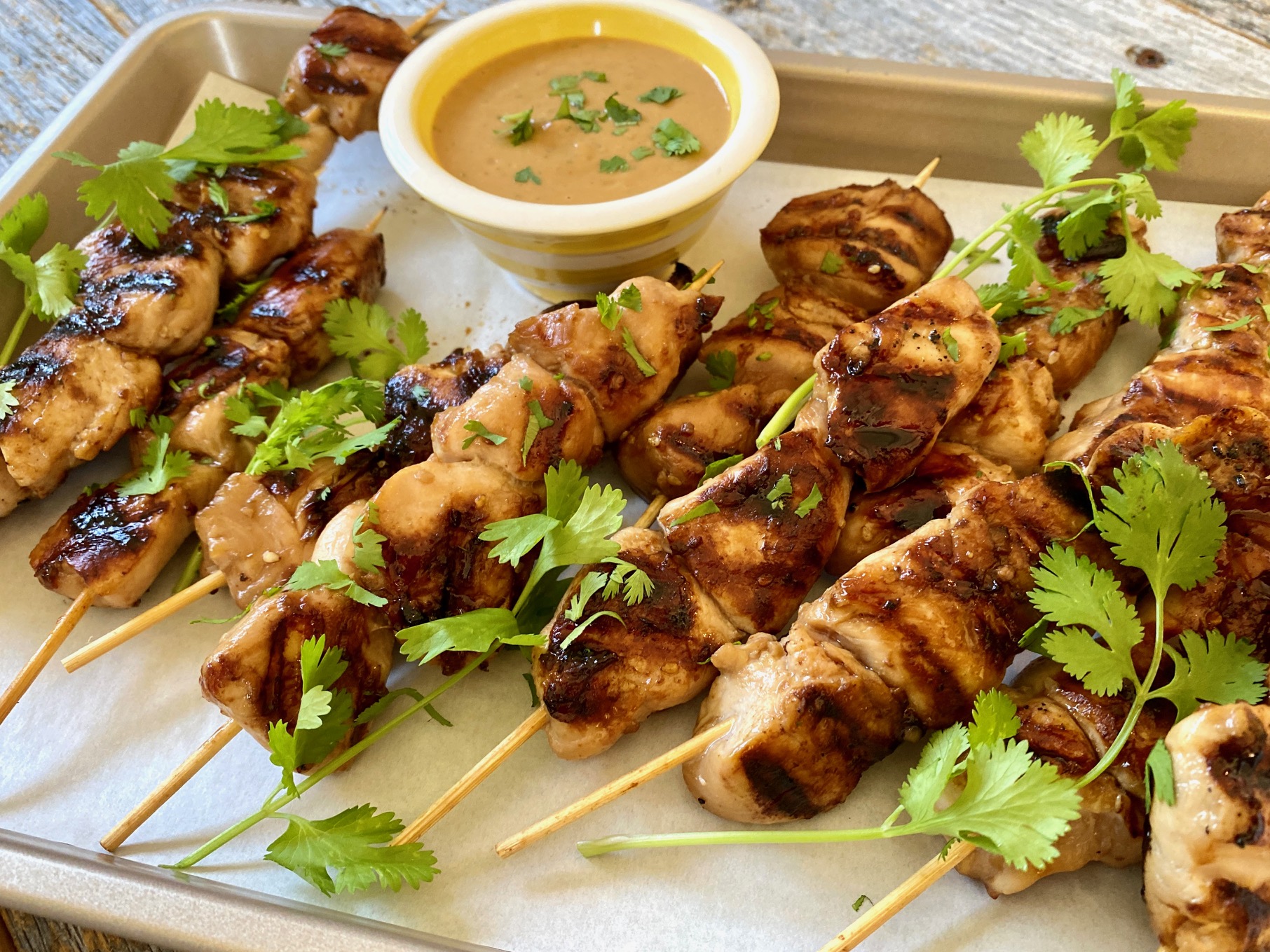 Grilled chicken shishkabobs on a tray