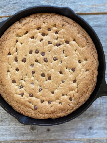 chocolate chip cookie in a cast iron skillet