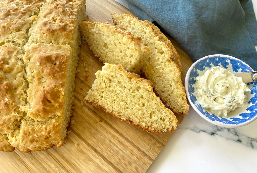 Slices of soda bread with dish of compound butter