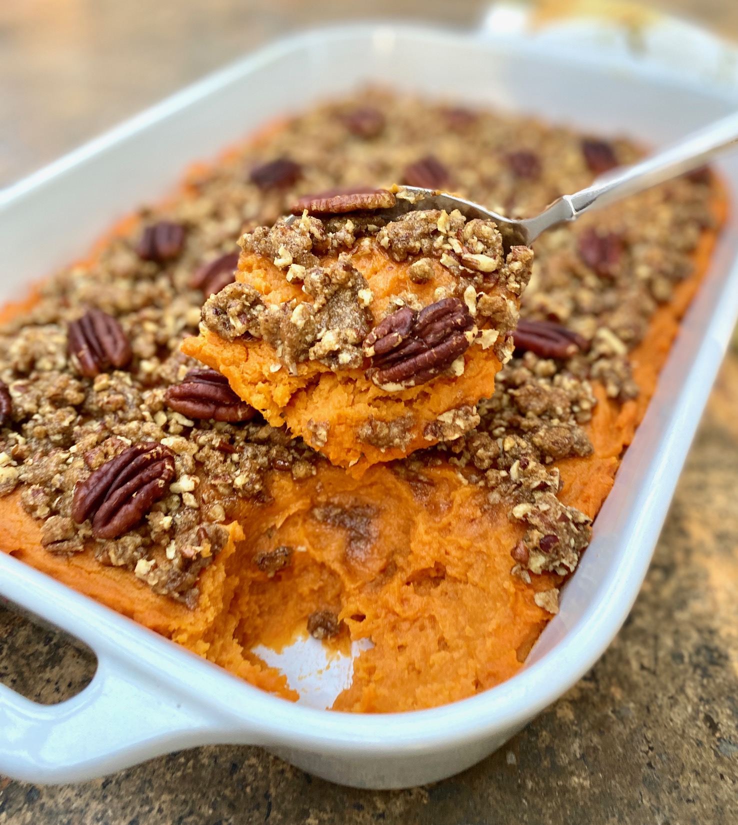 spoon of pecan sweet potatoes