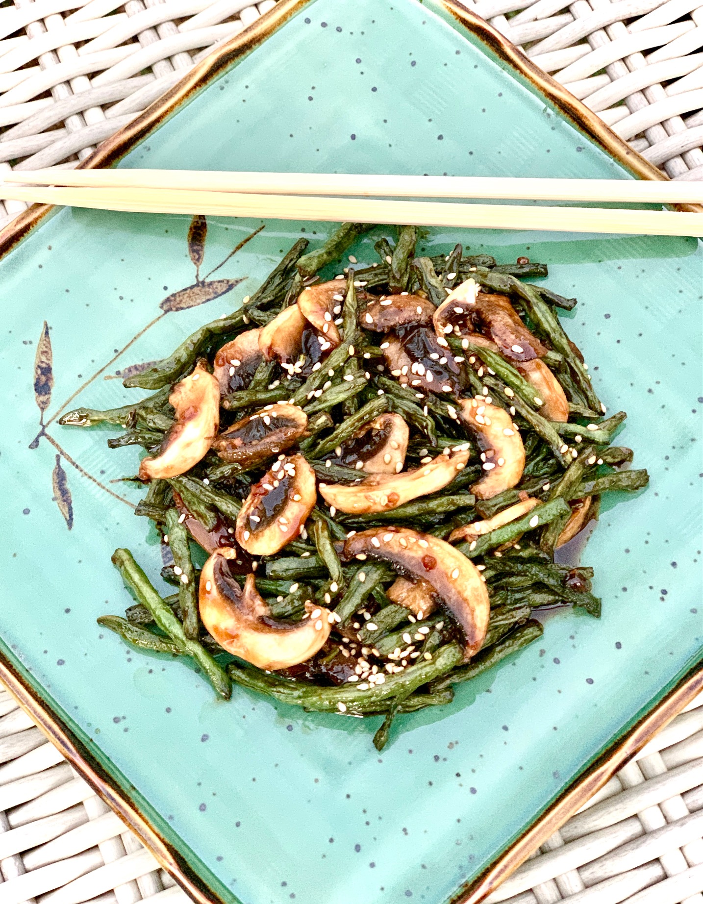 Szechuan beans on blue plate