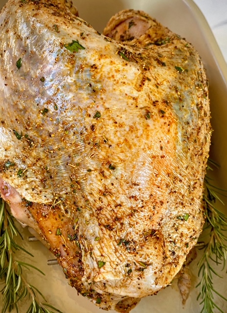 uncooked turkey with seasonings
