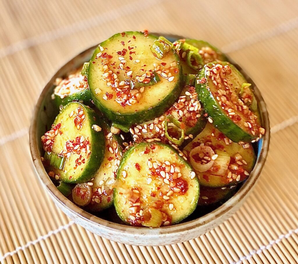 up close bowl of cucumbers with gochugaru