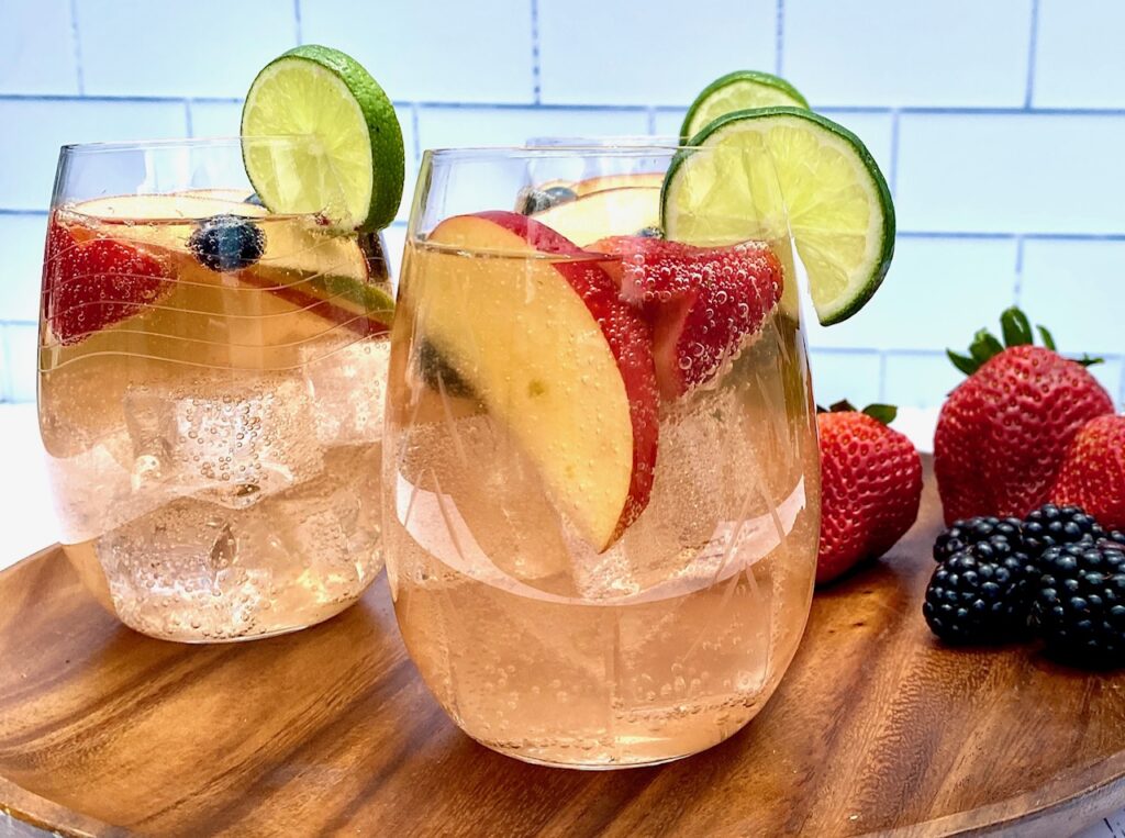 3 glasses of sangria with fruit